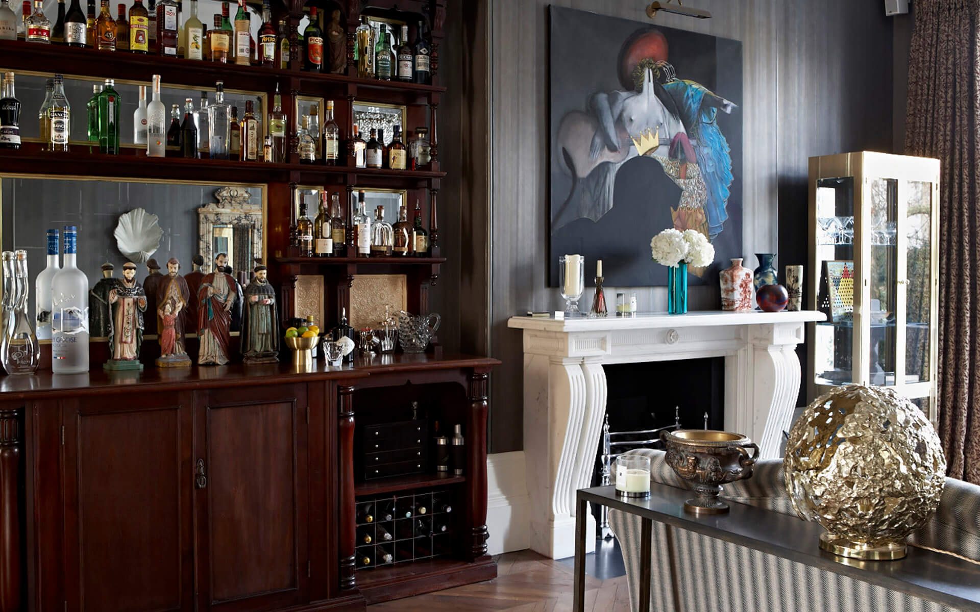 Stunning ceiling height wooden bar in luxury Ladbroke Grove interior designed family home.